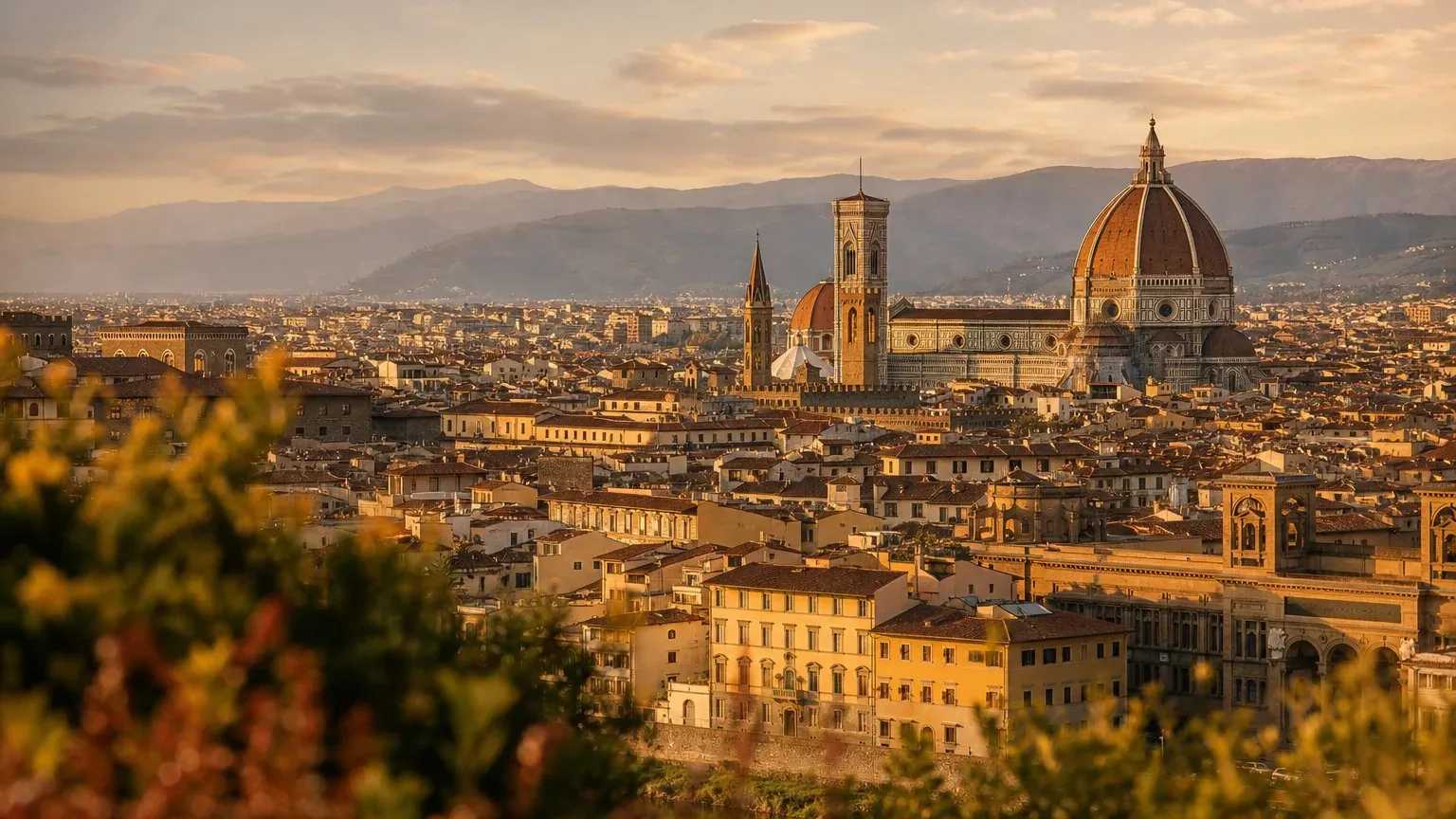 Golden hour view over Florence rooftops toward the Duomo dome